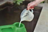 Clarity Pro - adding suspended product to watering can filled with pond water