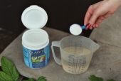 Ecotreat Clarity - adding the product to a container of water